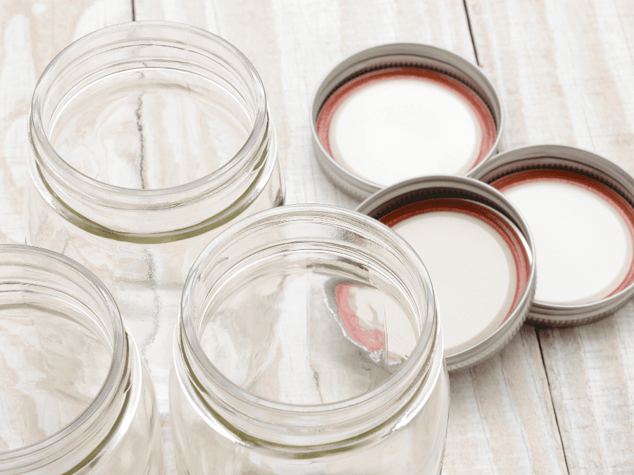  Boil Jars Before Canning: Close up of mason jars and lids before boiling 