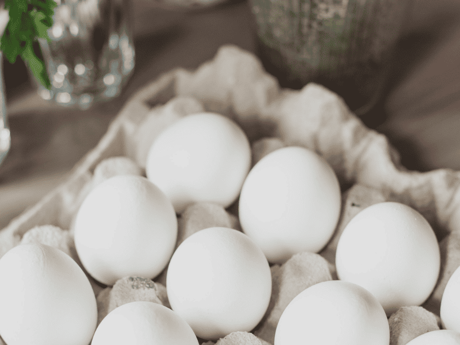 Different Coloured chicken eggs: white eggs in an egg carton