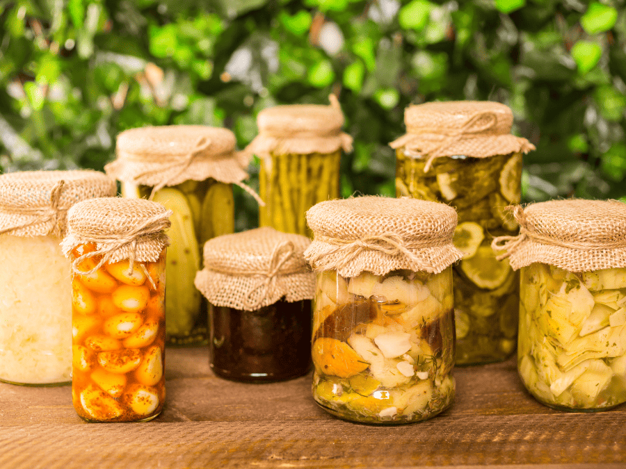 Eight jars of canned vegetables in a zero waste kitchen