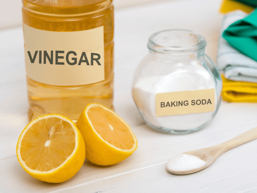 Vinegar, baking soda and a lemon, used to make homemade cleaner